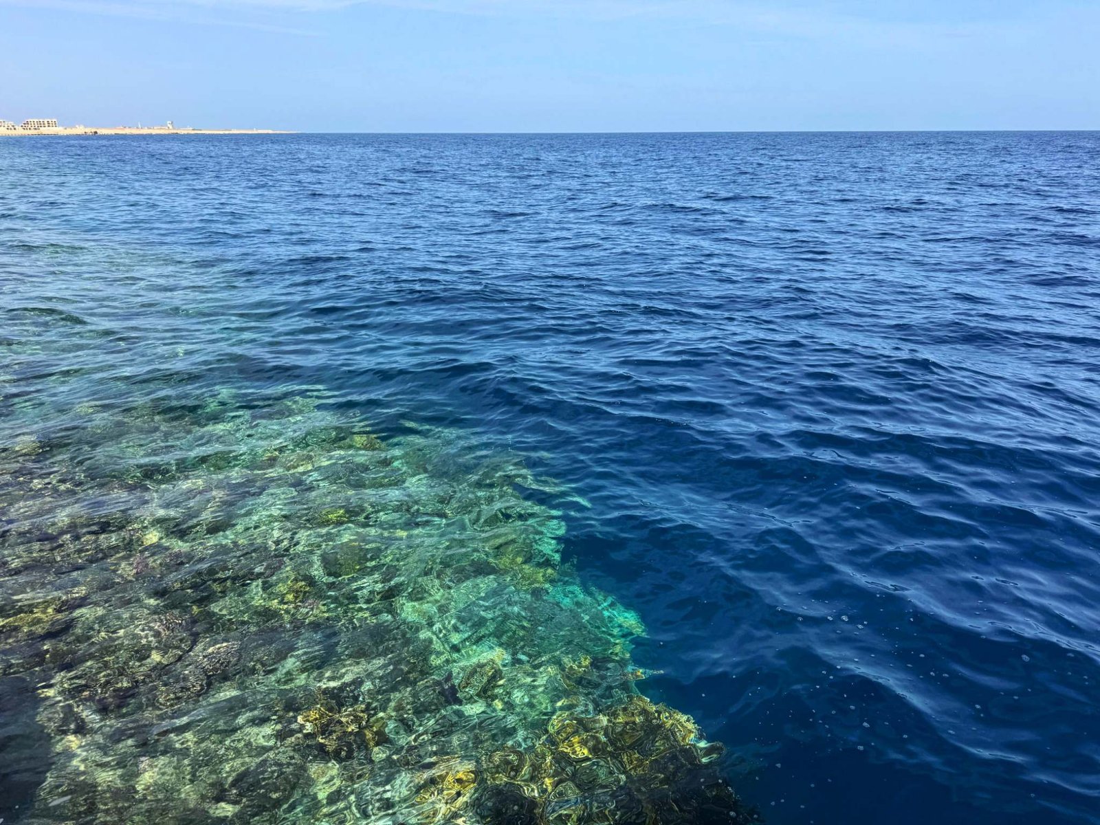 Clear water and coral reefs near Shams Soma, Soma Bay, Red Sea